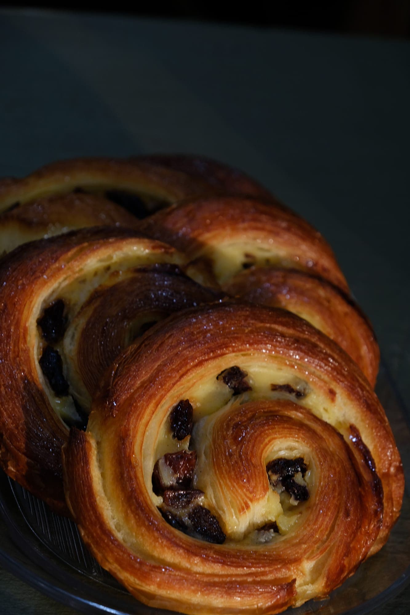 A glazed, fruit-studded morning bun