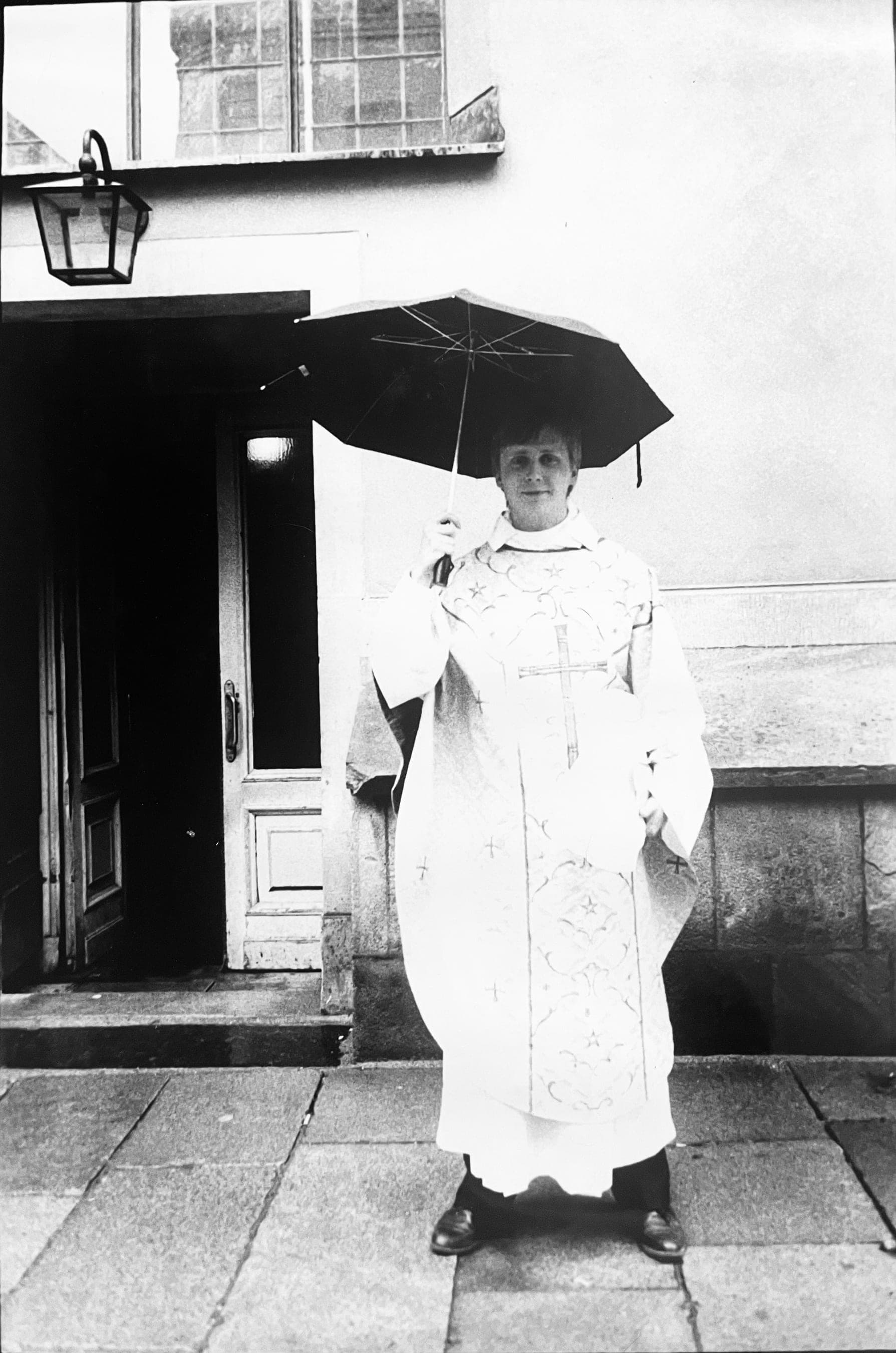 The vicar in his vestments — the framed portrait that hangs in the bakery